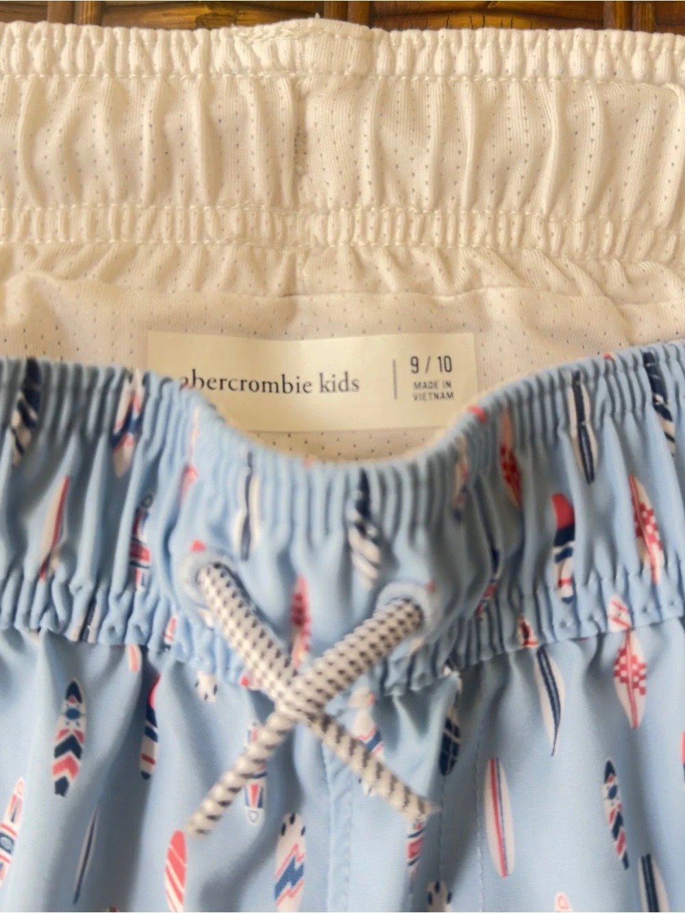 abercrombie kids Light Blue Swim Trunks with Coral & Navy Surfboard Print